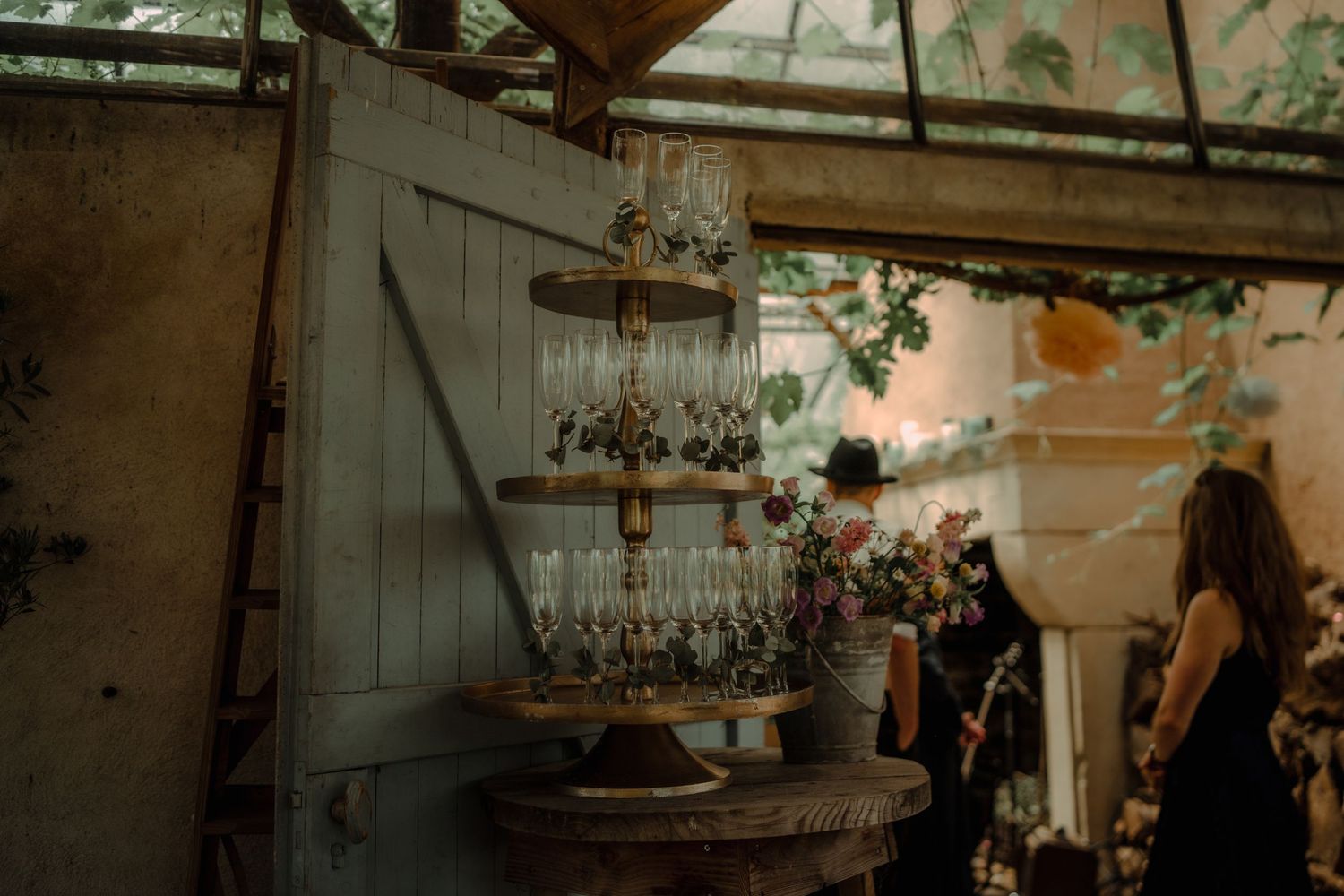 Vintage wooden door and decorative display at rustic wedding venue.