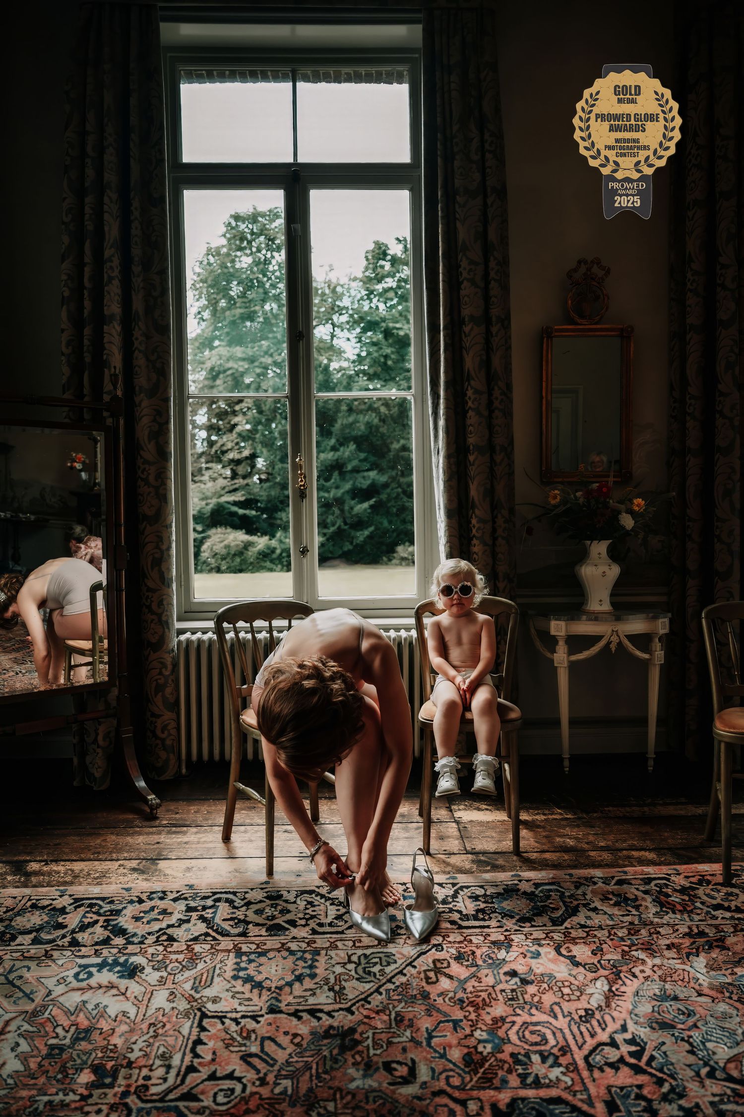 A moody sequence of photos showing a figure moving across a dark room with ornate rugs and large windows.