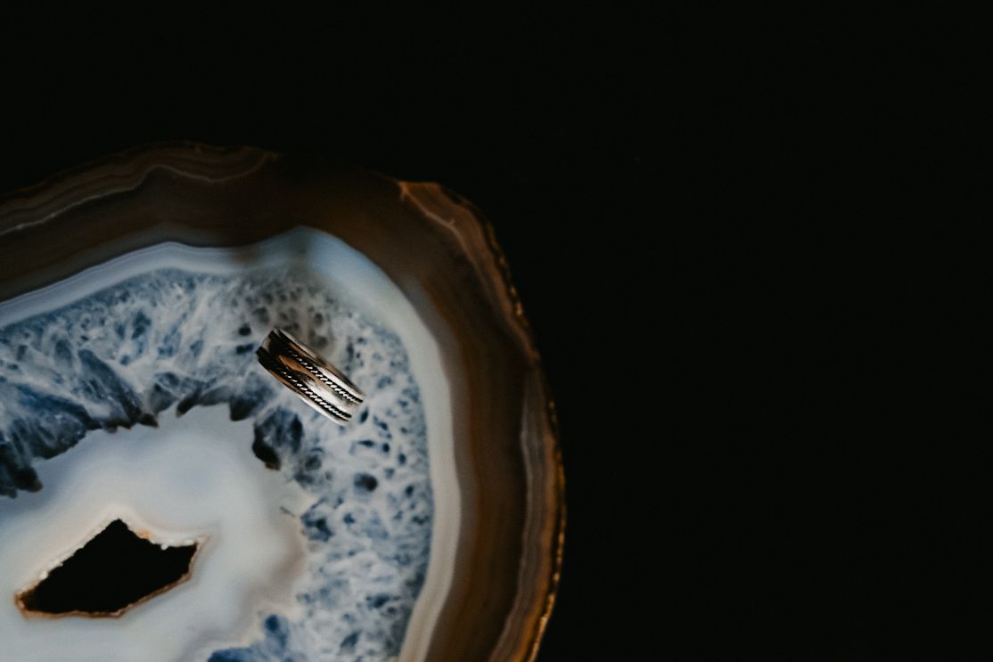 A series of blue and white porcelain plates and dishes with delicate floral patterns displayed in a collection.