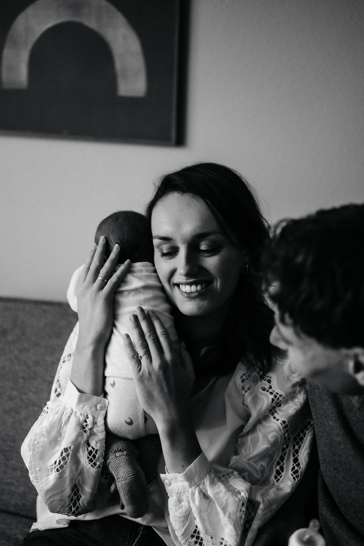 A joyful black and white moment captured on a comfortable couch.