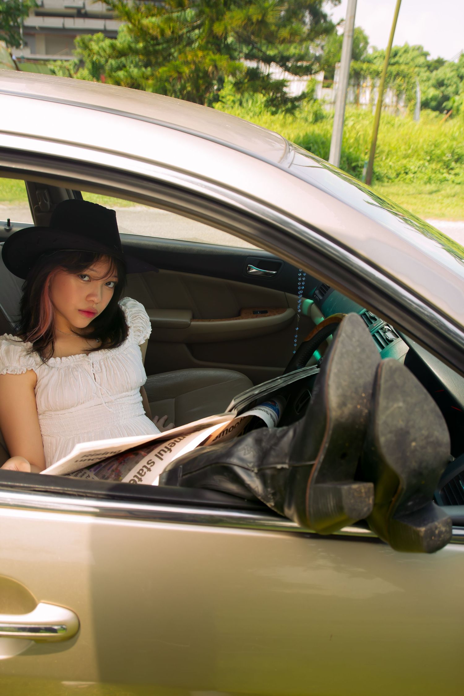 cowgirl in her car