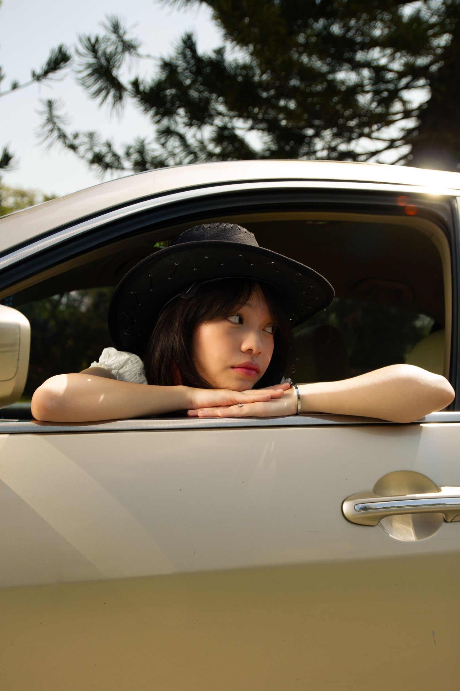 cowgirl looking out the window