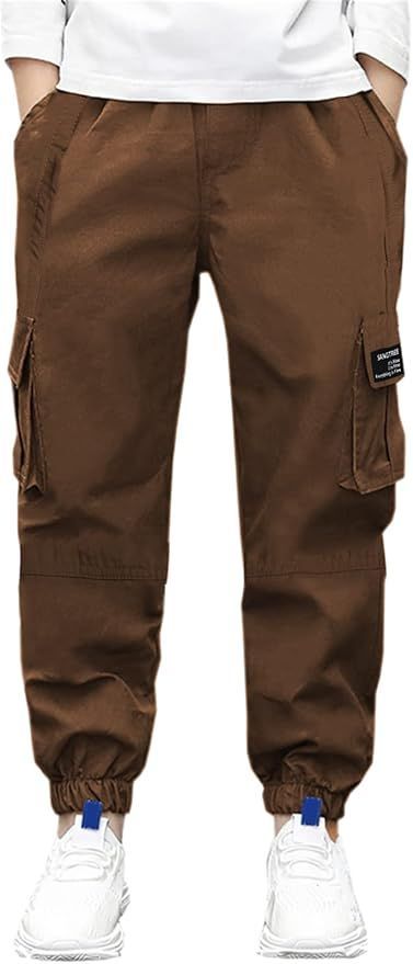 Brown cargo pants with elastic cuffs and side pockets featuring utility patch design.