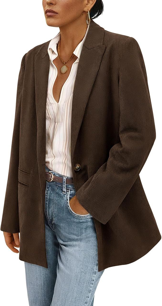 Brown corduroy blazer styled with white shirt and gold necklace.