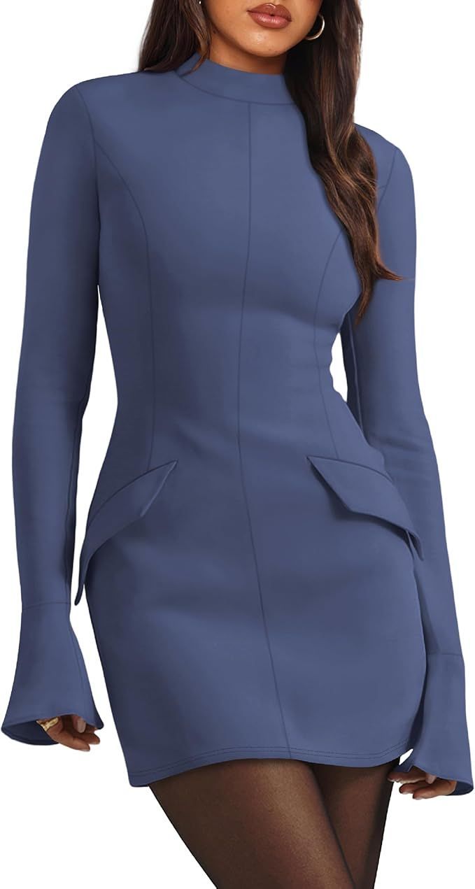 Navy blue fitted top with bell sleeves and mock neckline.