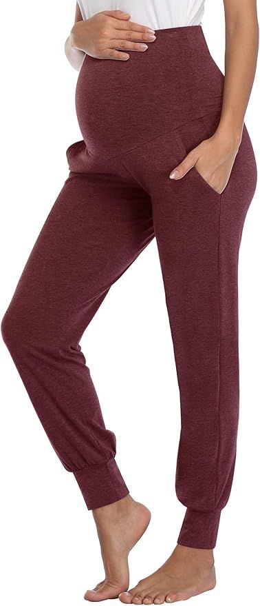 Maternity loungewear jogger pants in burgundy with high waistband support and tapered ankle cuffs.