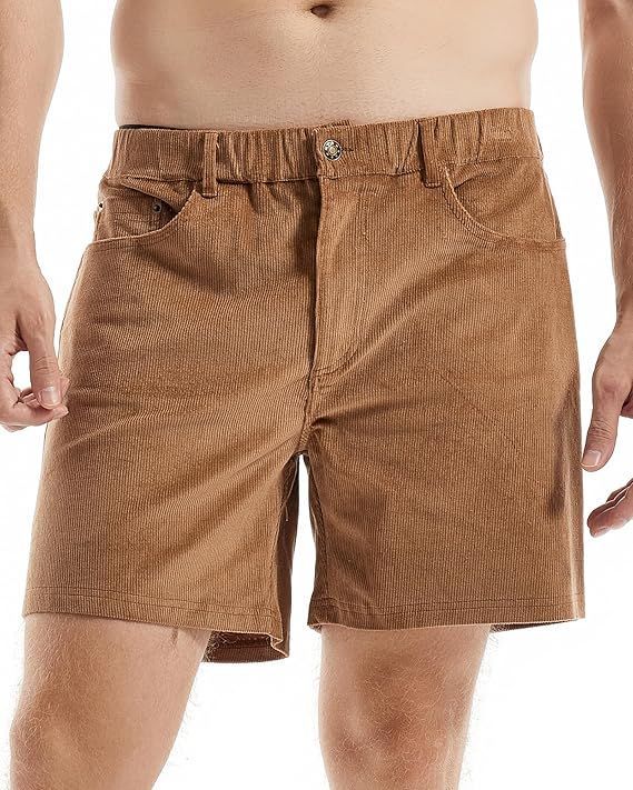 Tan elastic waist shorts with classic five-pocket design.
