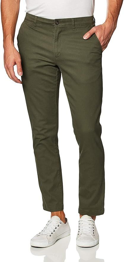 Olive green chino pants with straight fit and front pockets.