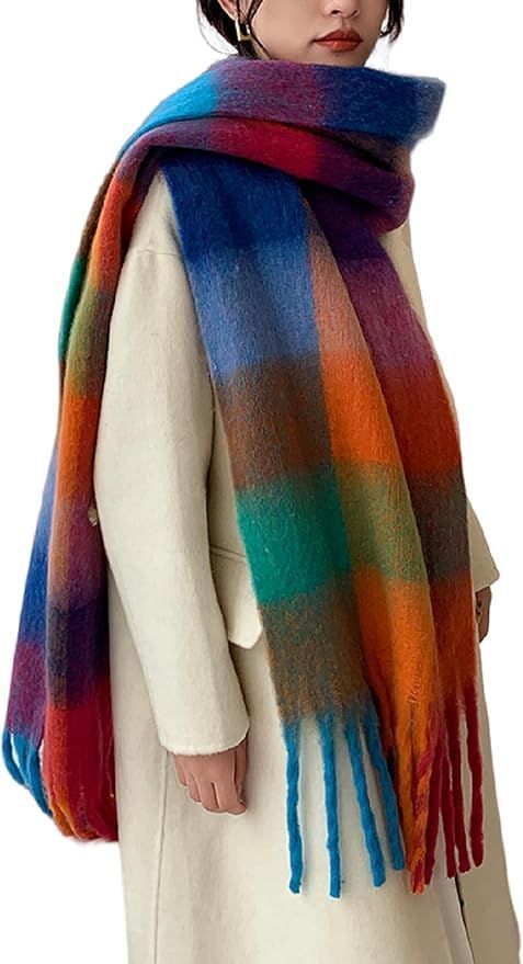 Colorful rainbow striped wool scarf with fringe tassels.