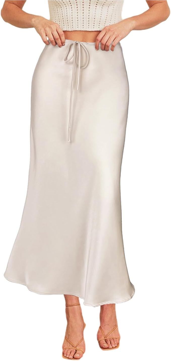 Elegant cream silk maxi skirt with drawstring waist and flowing silhouette.