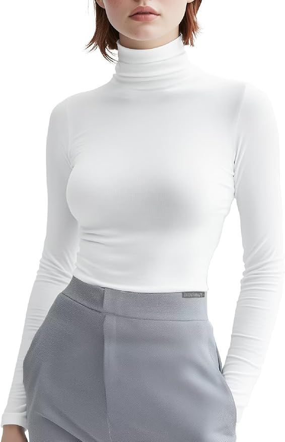 White turtleneck top paired with gray pants shown in multiple angles against white background.