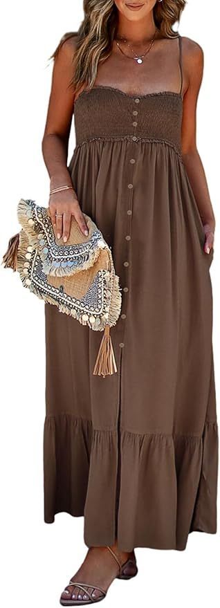 Brown maxi dress with smocked bodice and button front, paired with fringed straw clutch.