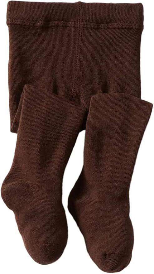 Row of brown knit baby socks arranged in descending size order.