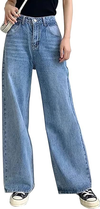 High-waisted light wash wide leg jeans styled with casual sneakers for a trendy relaxed look.