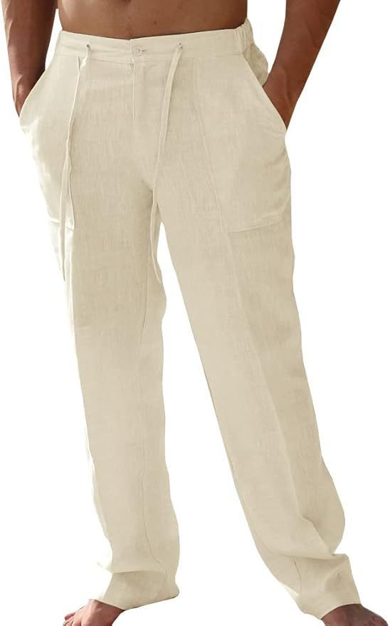 Cream colored linen drawstring pants with straight leg cut and side pockets.
