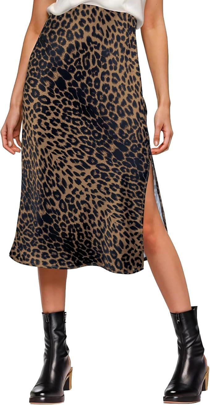 Leopard print midi skirt with side slit and high-waisted silhouette.