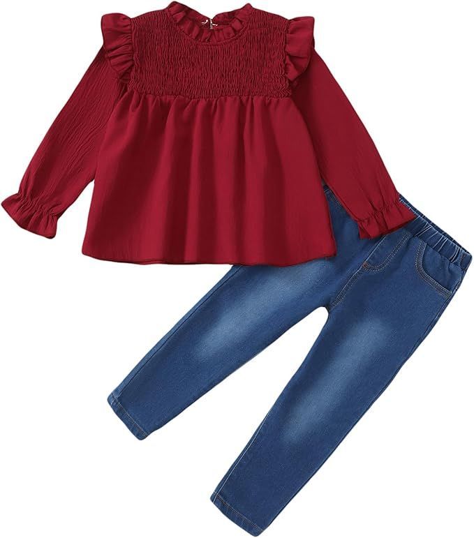 Red smocked toddler girl's blouse with jeans outfit set.