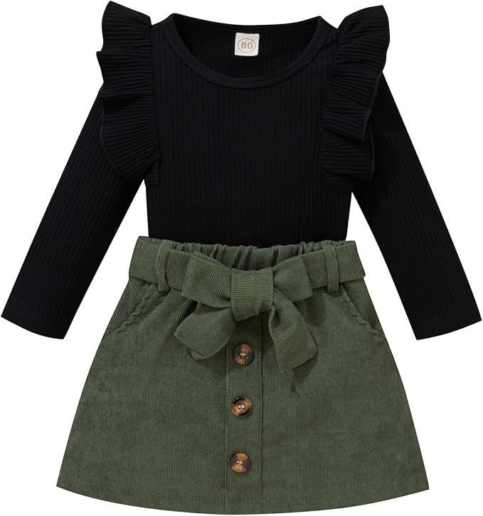 Black top with green corduroy skirt baby girl outfit set.