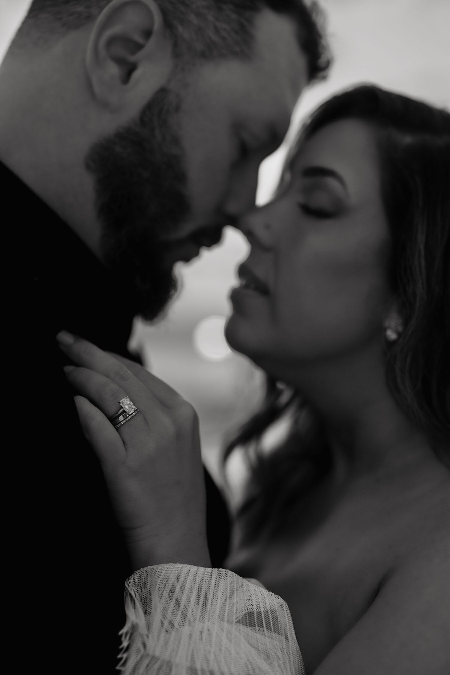 A romantic black and white photo series showing intimate close-up moments between a couple.
The Ringling