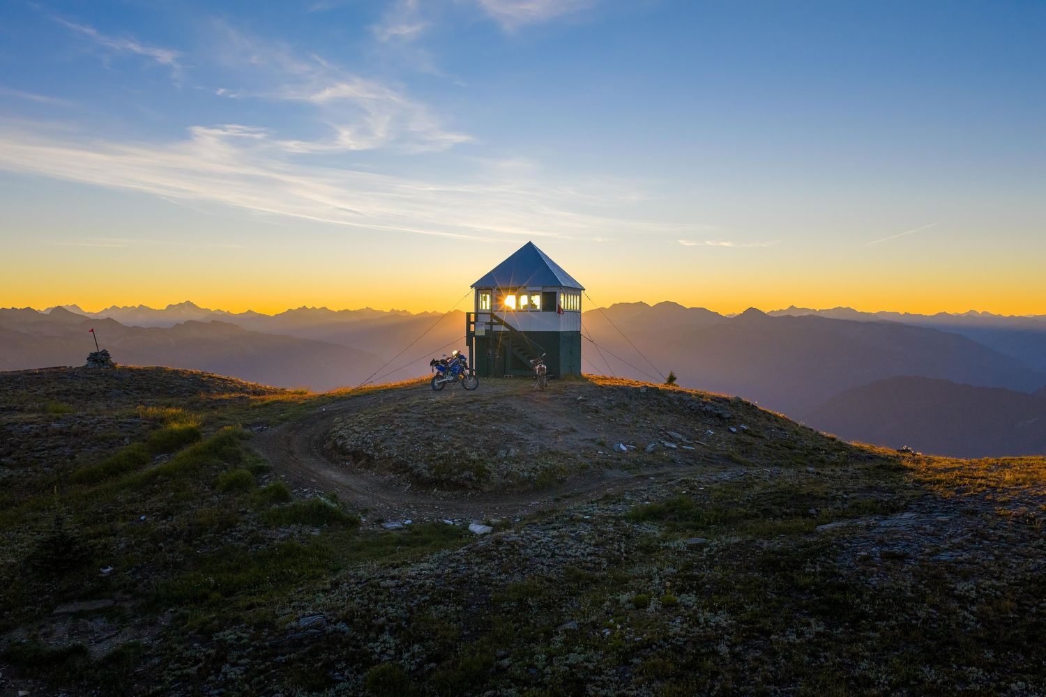 Sunrise drone footage over alpine ridgeline in Western Canada for tourism marketingRevelstoke drone photography, aerial videography Revelsto