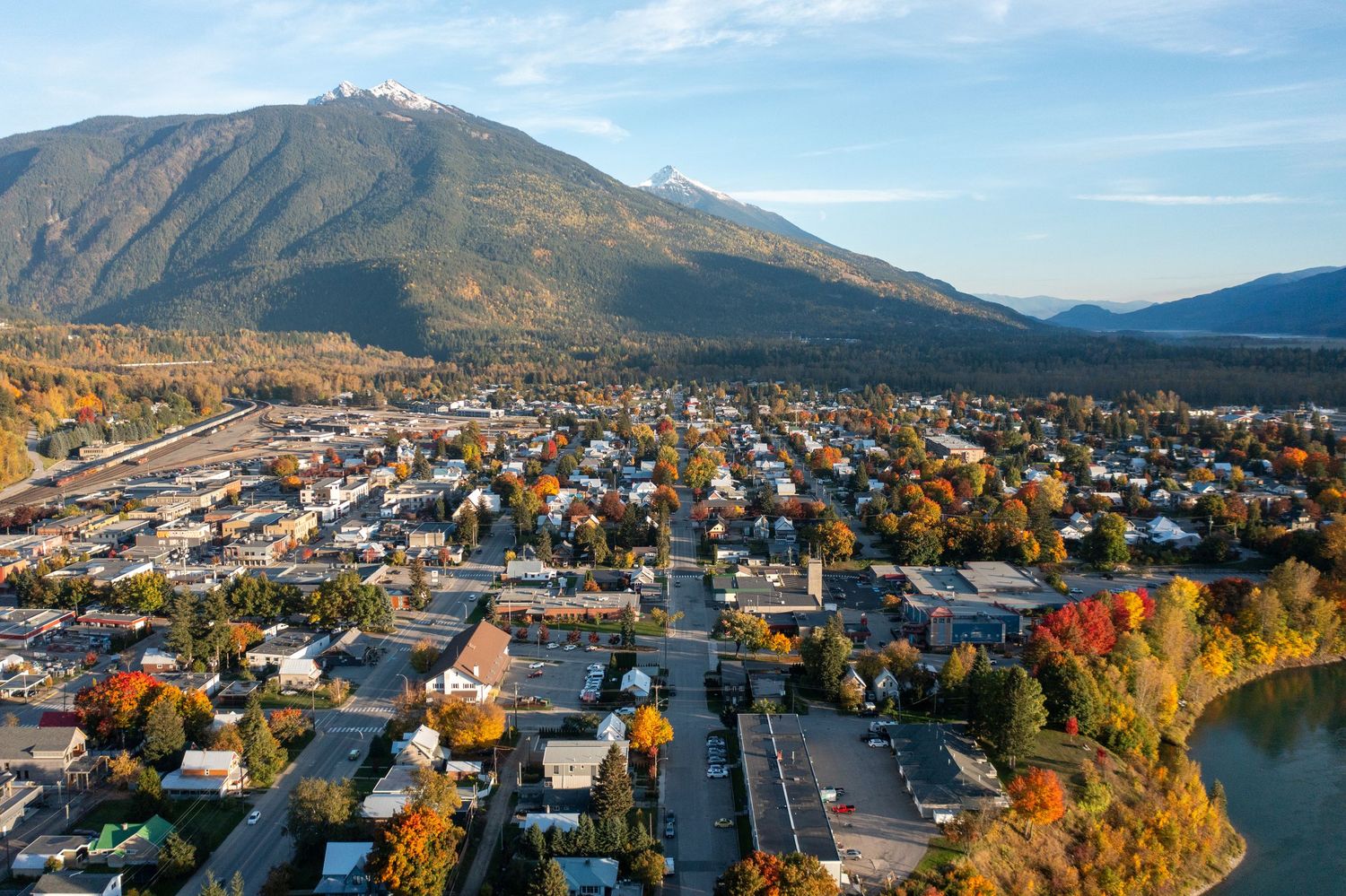 Aerial drone shot highlighting building exterior and surrounding landscape in BC
