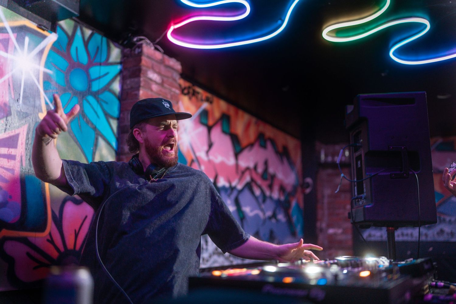 performing live at The Last Drop pub in Revelstoke, BC festival photography, corporate event photos, community event coverage, on-site