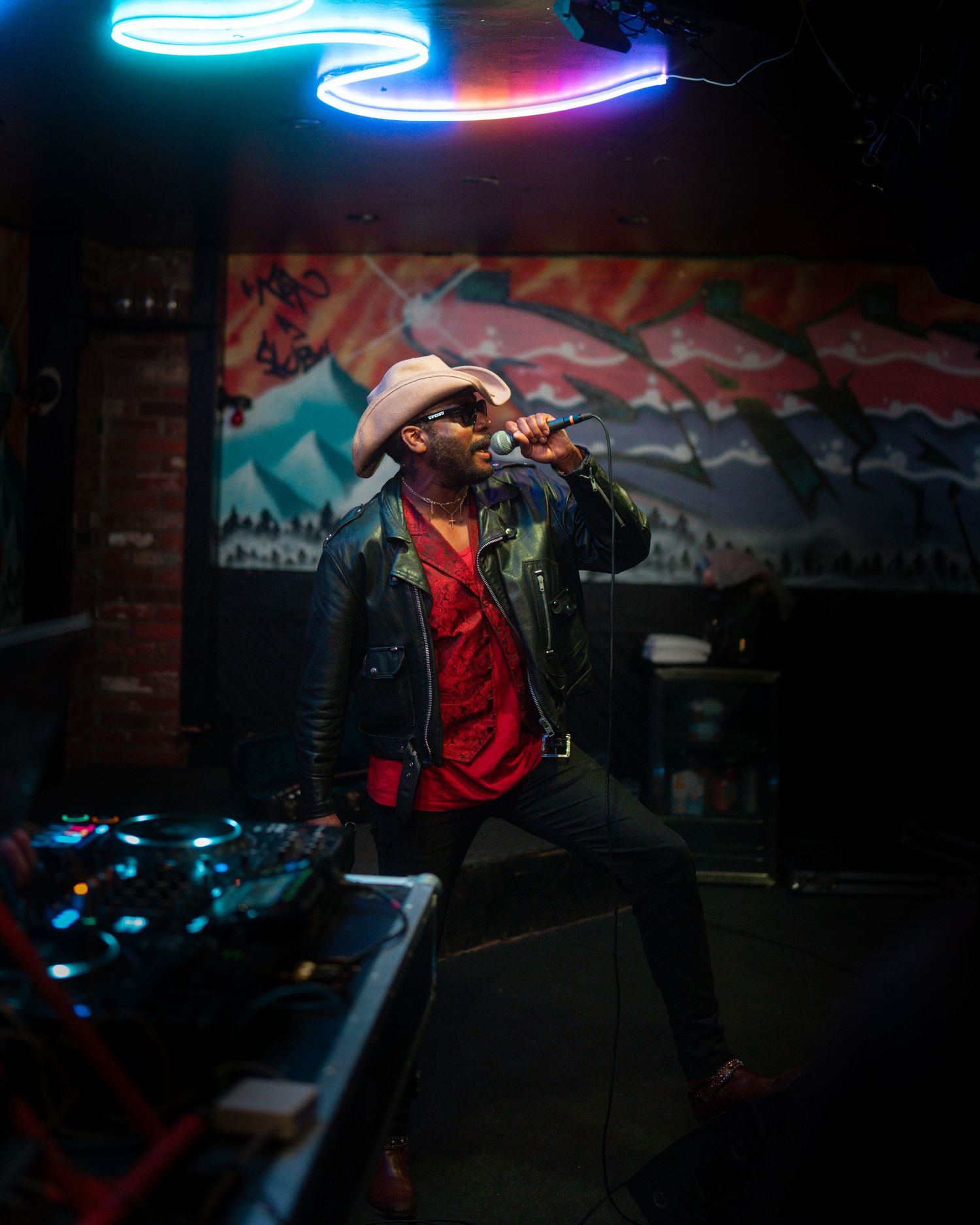 k-os  performing live at The Last Drop pub in Revelstoke, BC festival photography, corporate event photos, community event coverage, on-site