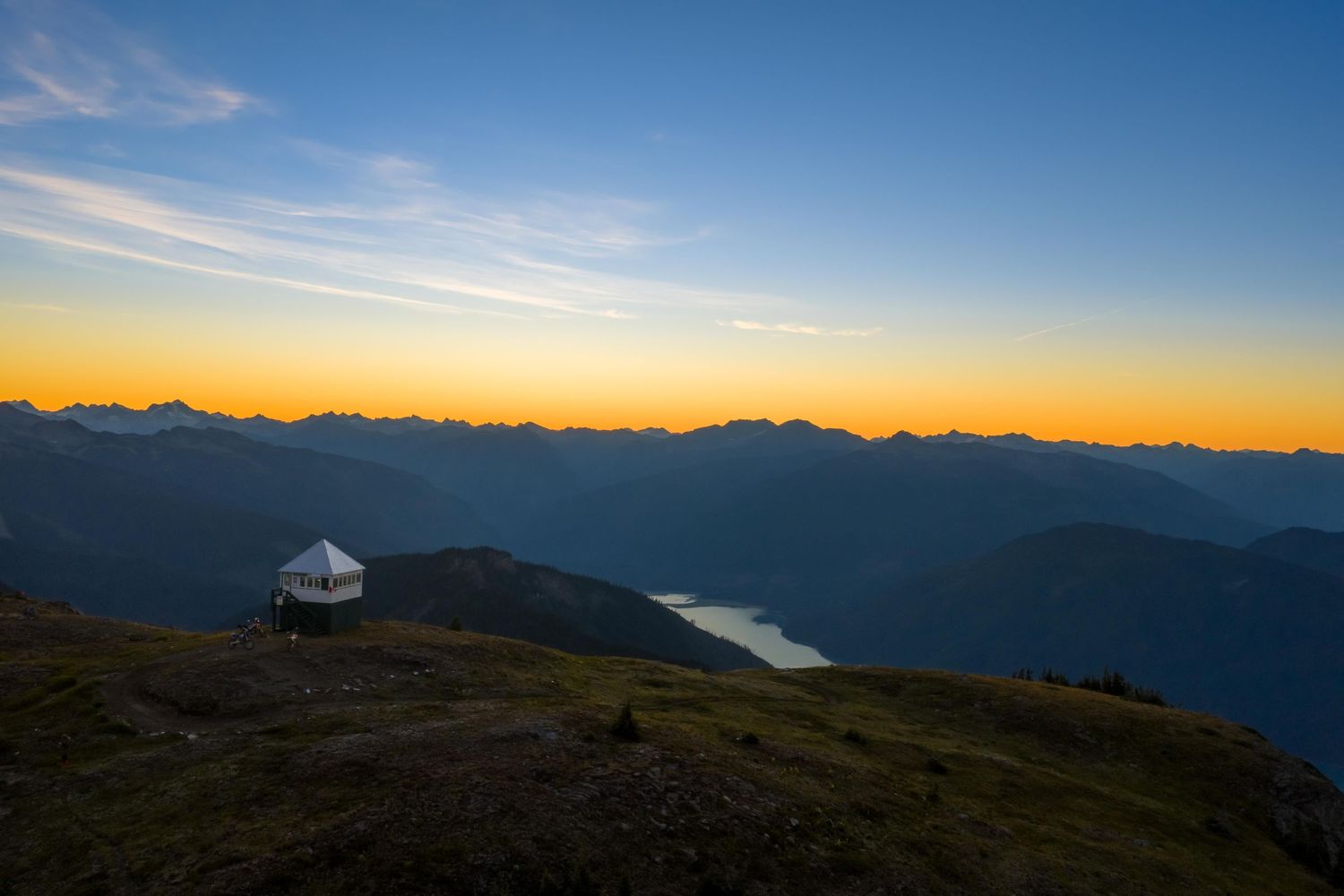 Sunrise drone footage over alpine ridgeline in Western Canada for tourism marketing Revelstoke videographer, cinematic storytelling video, c