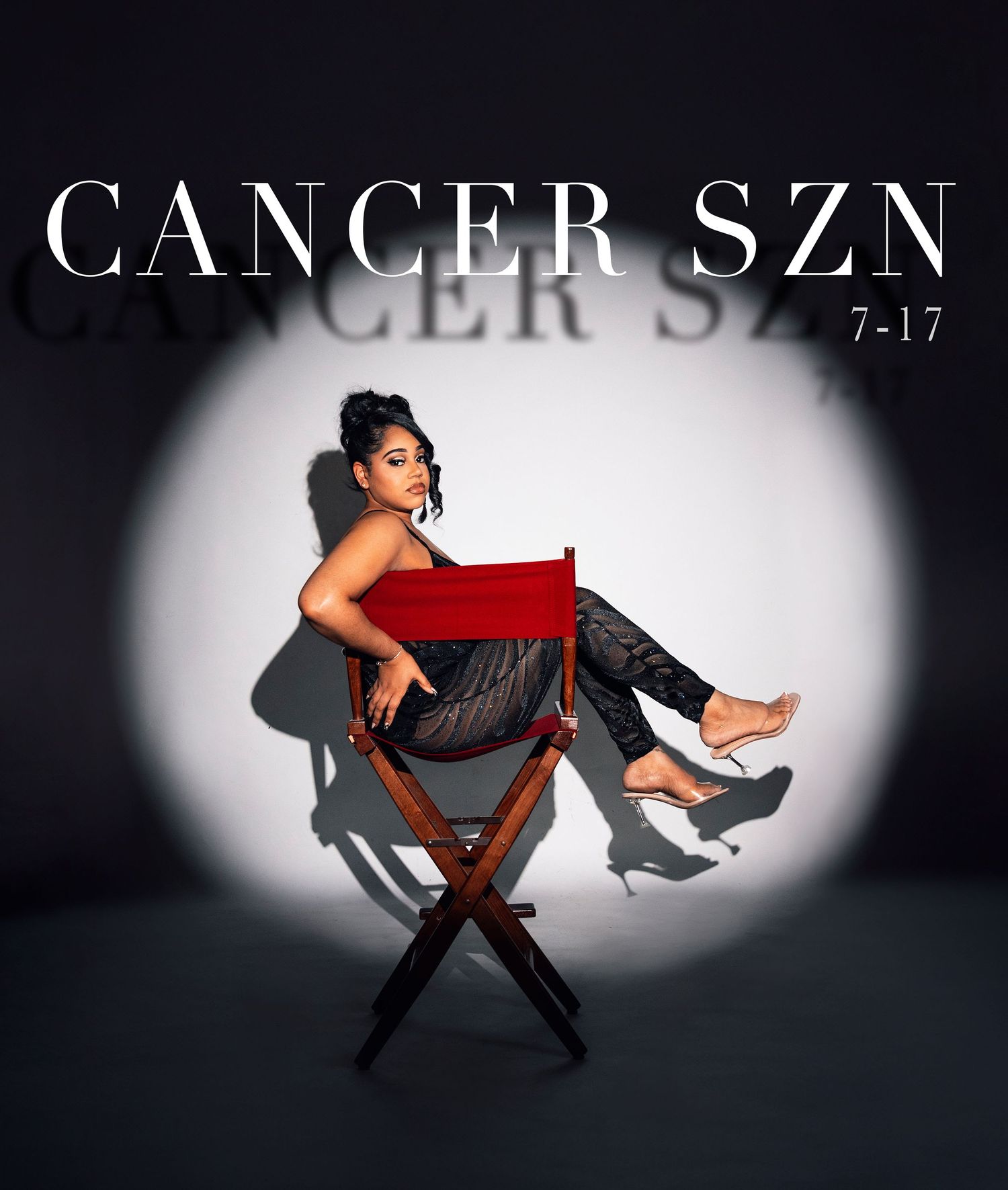 A stylish promotional image showing someone seated in a director's chair with 
