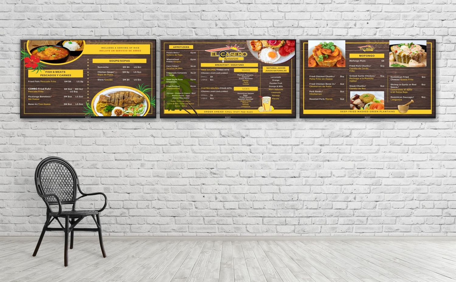 Restaurant menu boards displaying food options mounted on white brick wall with chair.