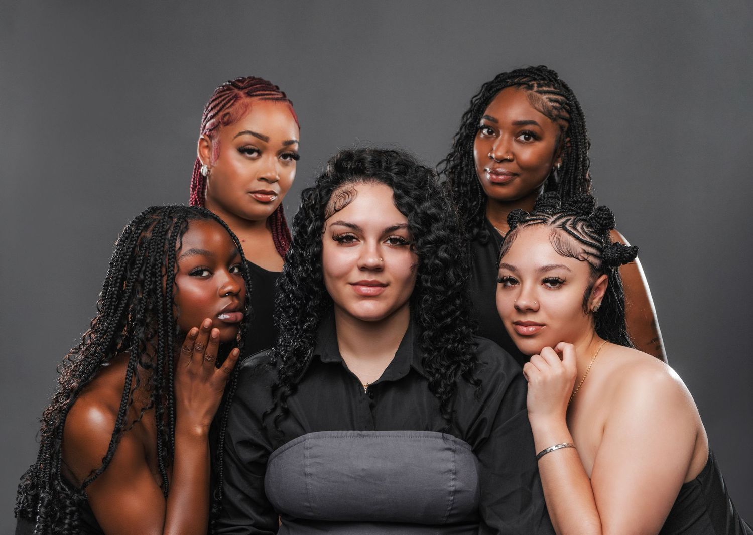 A black and white collage of women posing together in an intimate artistic photoshoot.