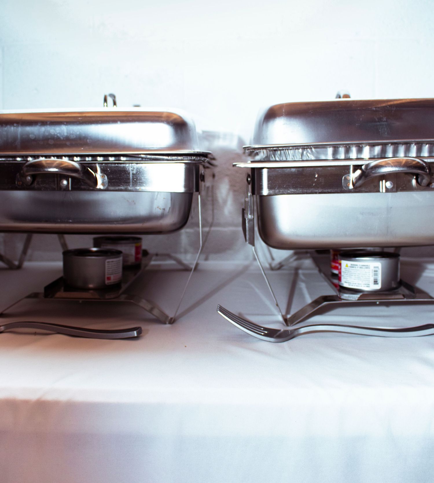 A sequence showing the reflection of light off curved metal surfaces creating dramatic mirror effects and highlights.