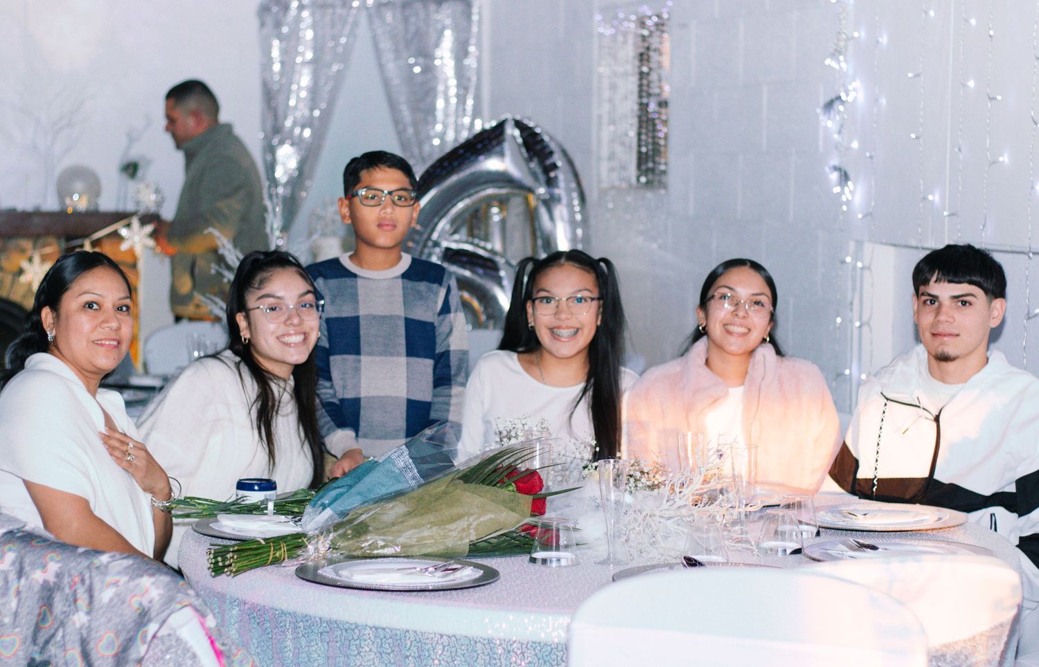 Five stills from a birthday celebration showing cakes, decorations, and people gathered around tables.