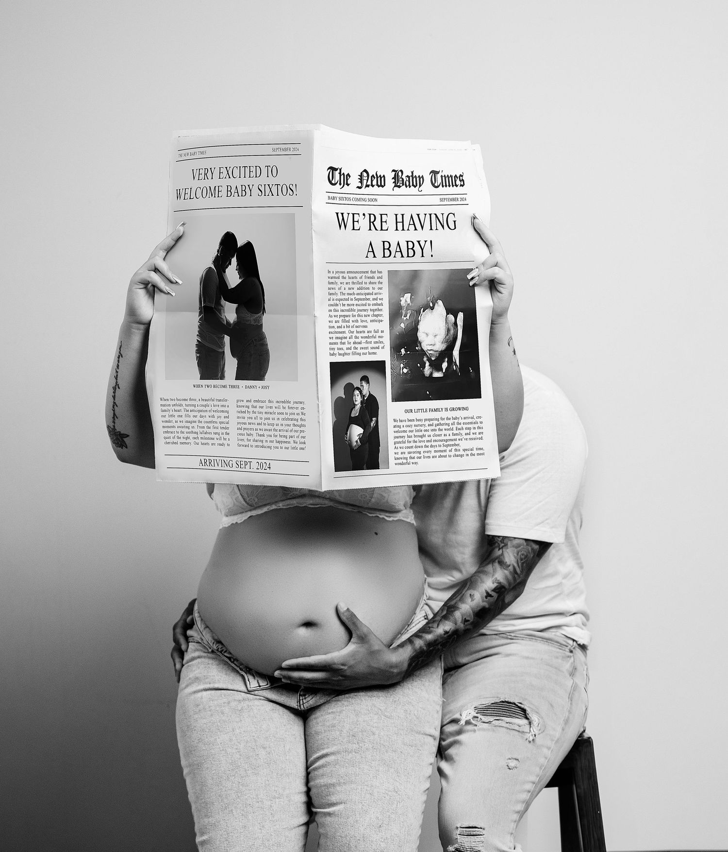 Creative pregnancy announcement photo with newspaper and visible baby bump.