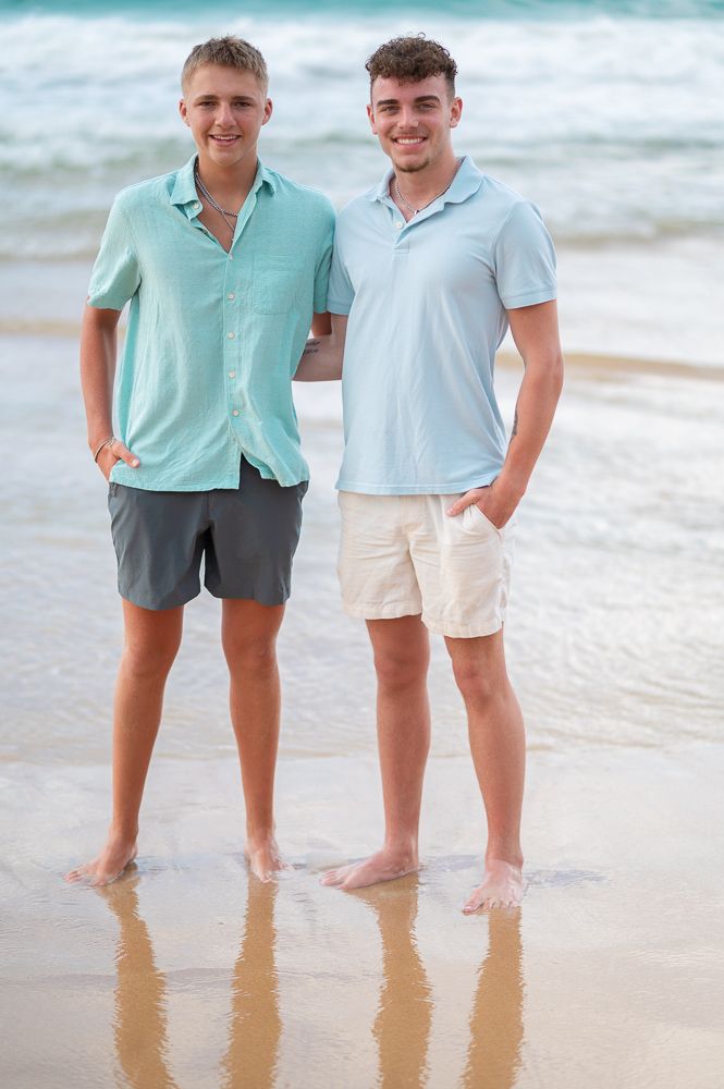 brothers standing beside each other playa azul Luquillo Puerto Rico