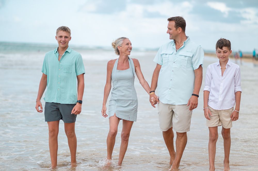 Family portrait session with parents and child on Playa Azul beach in Luquillo Puerto Rico”