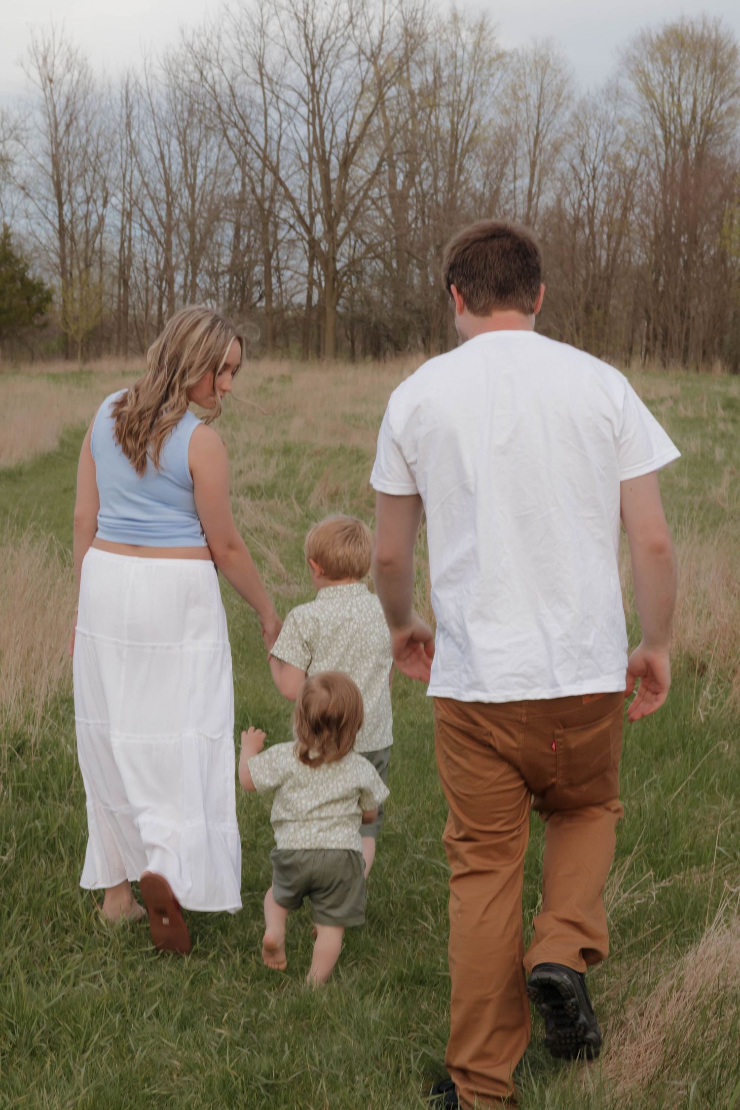 Outdoor Family photos with dog 
inspiration photos 
true to color
big rapids mi, Stanwood mi
Photo by: Lydia Rae Photography