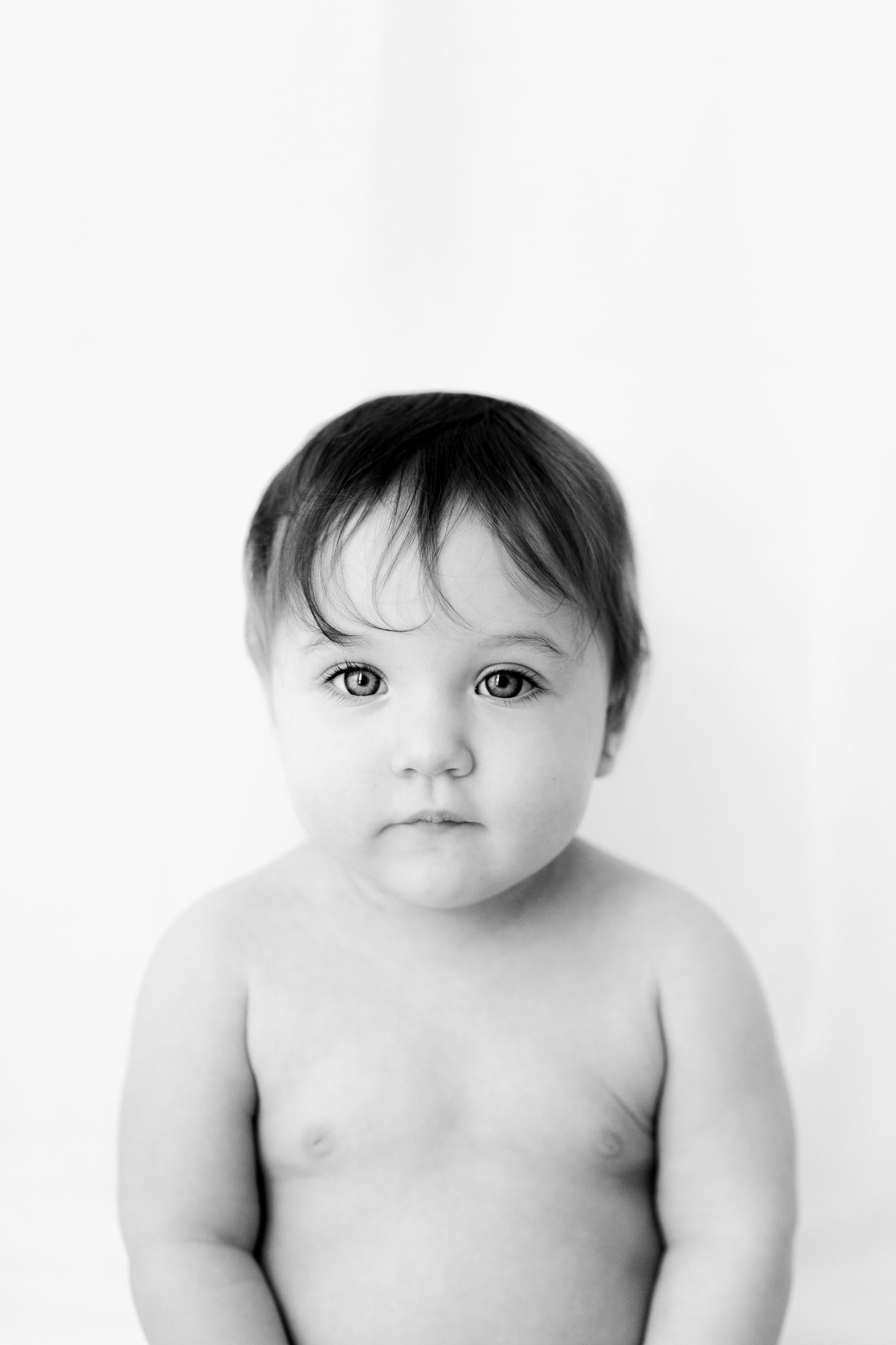 cute baby smiling in studio portrait