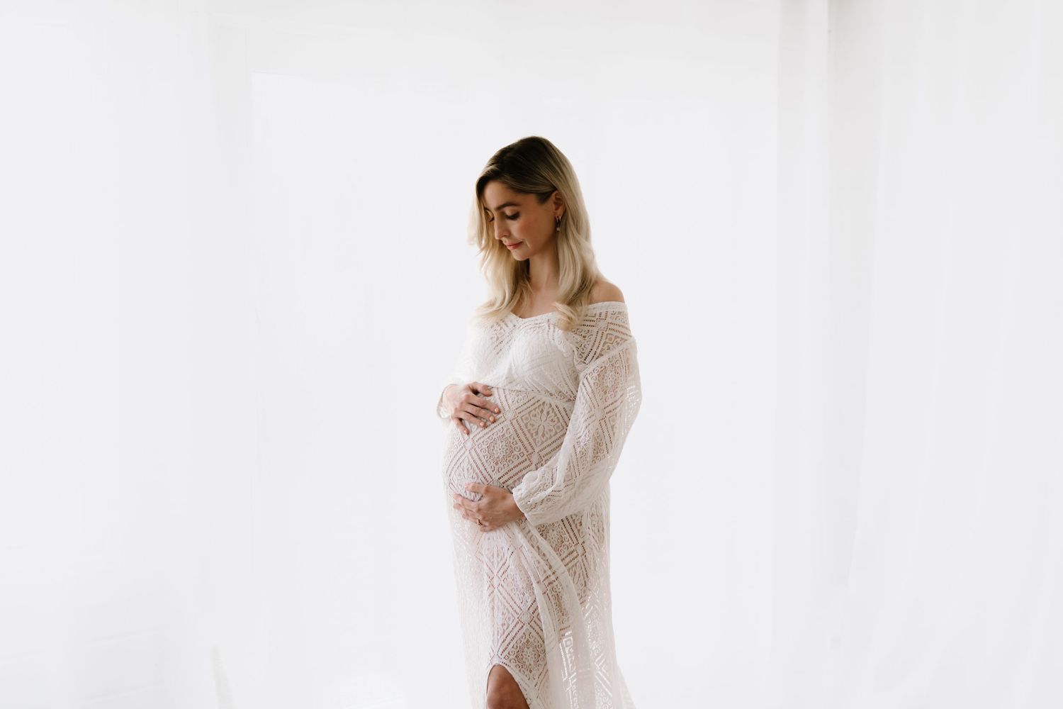 Studio maternity photography featuring our curated client wardrobe. A modern and minimalist session by Little Wild Ones, Torbay.