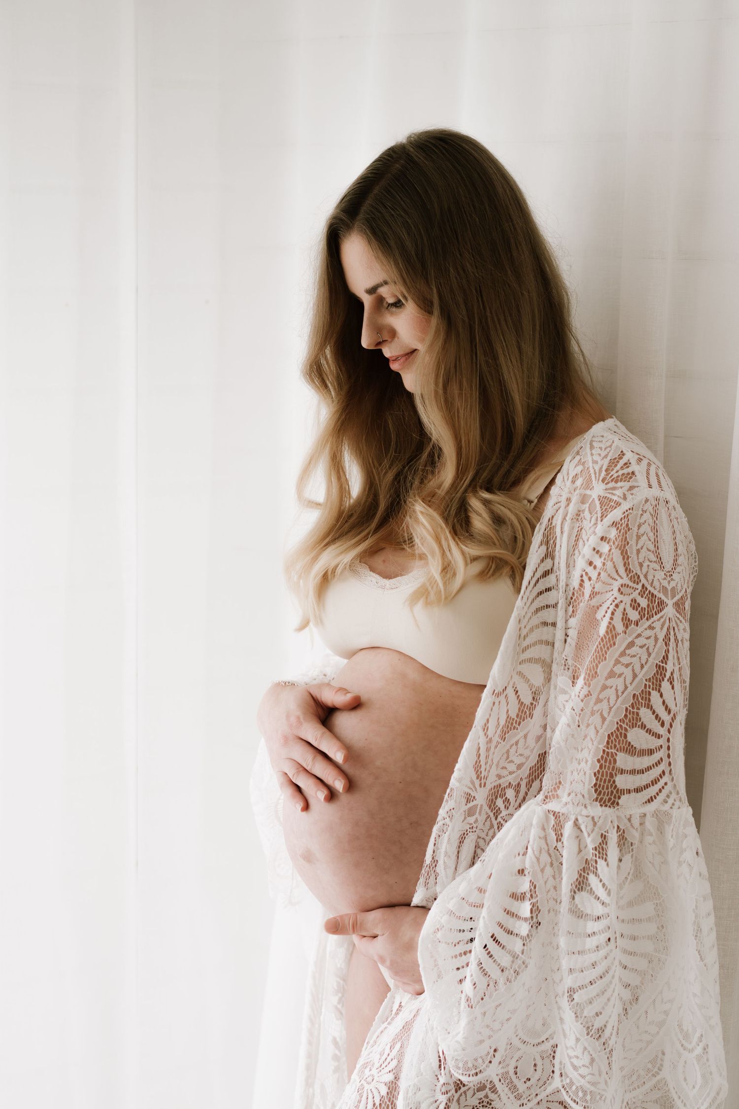 Studio maternity photography featuring our curated client wardrobe. A modern and minimalist session by Little Wild Ones, Torbay.