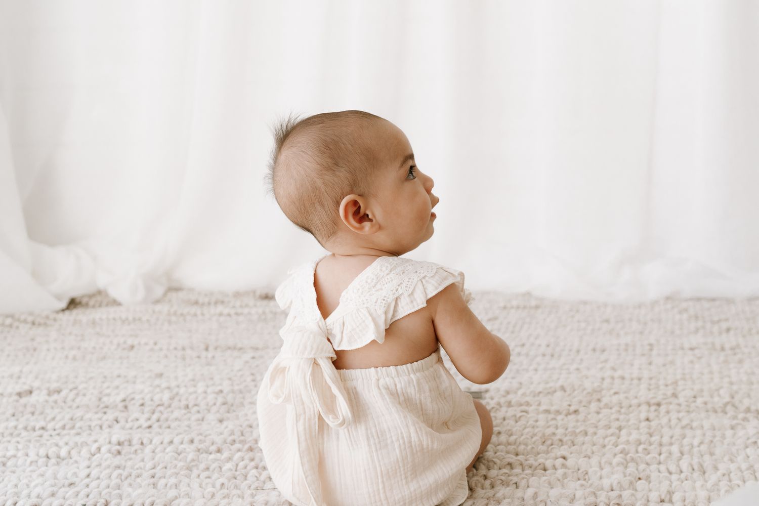 baby in family portrait photoshoot