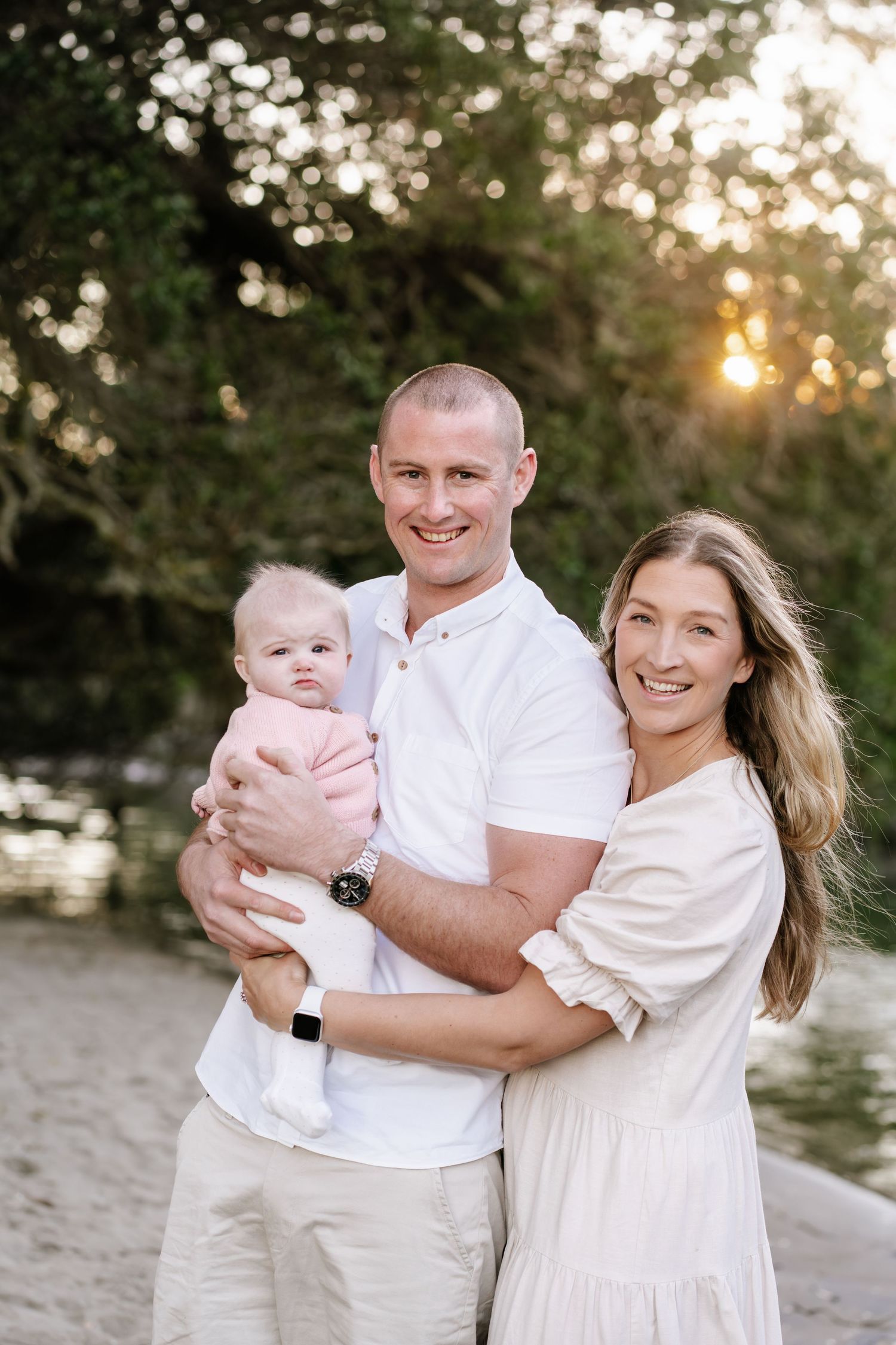 Candid family fun at sunset on the North Shore. Natural light and baby-led photography by Little Wild Ones, Auckland.