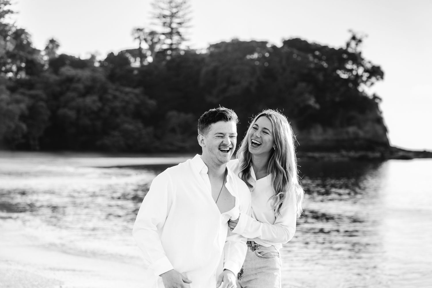 Family portrait session featuring parents and their older children sharing laughter and connection. A mix of posed and candid shots in a nat