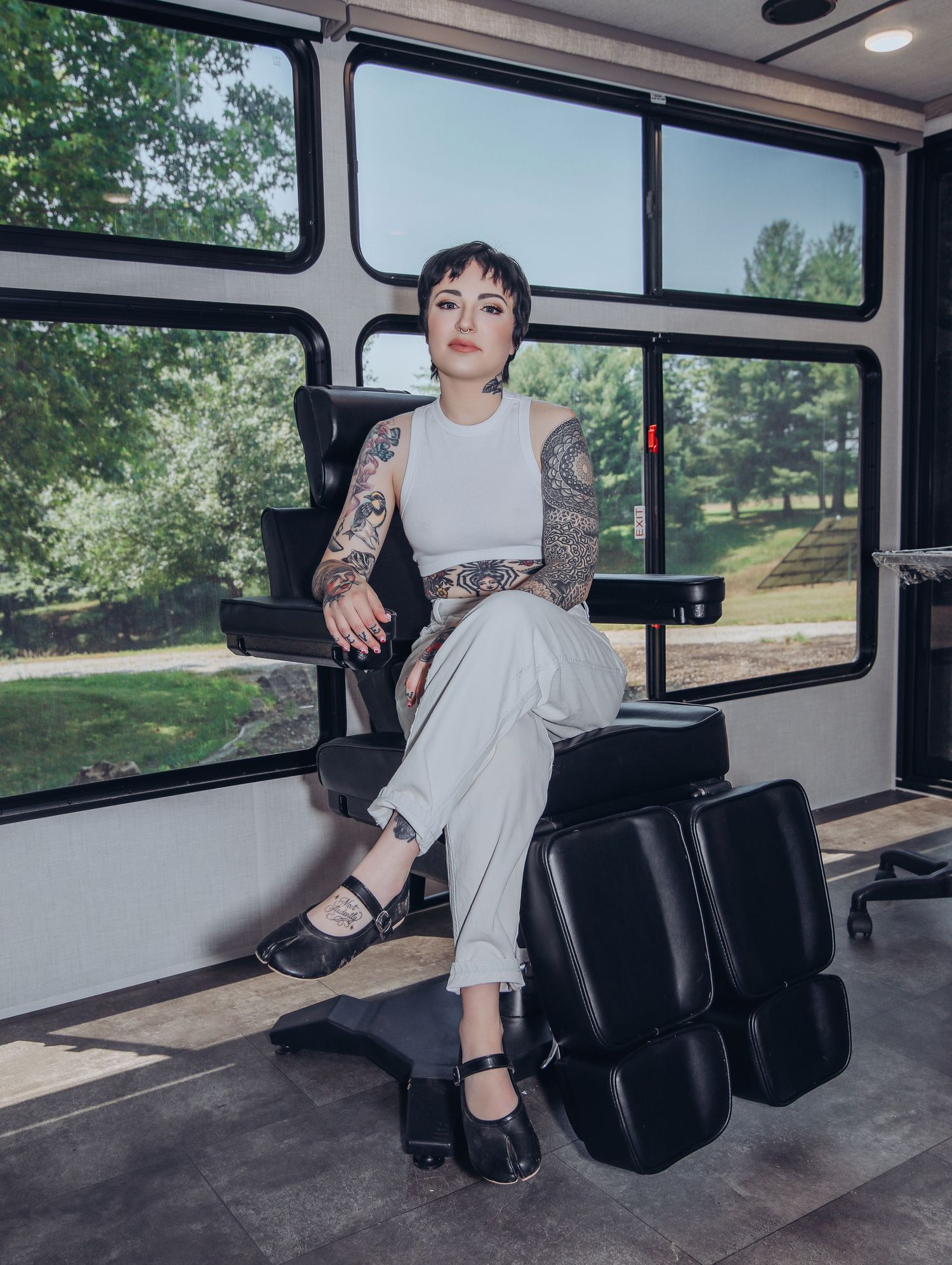 Boudoir by Bri photoshoot of small business branding and headshots for tattoo artist in St. Louis on location, young tattooed artist