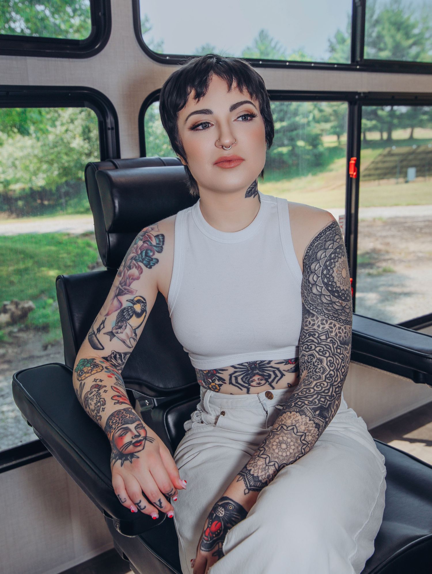 Boudoir by Bri photoshoot of small business branding and headshots for tattoo artist in St. Louis on location, young tattooed artist