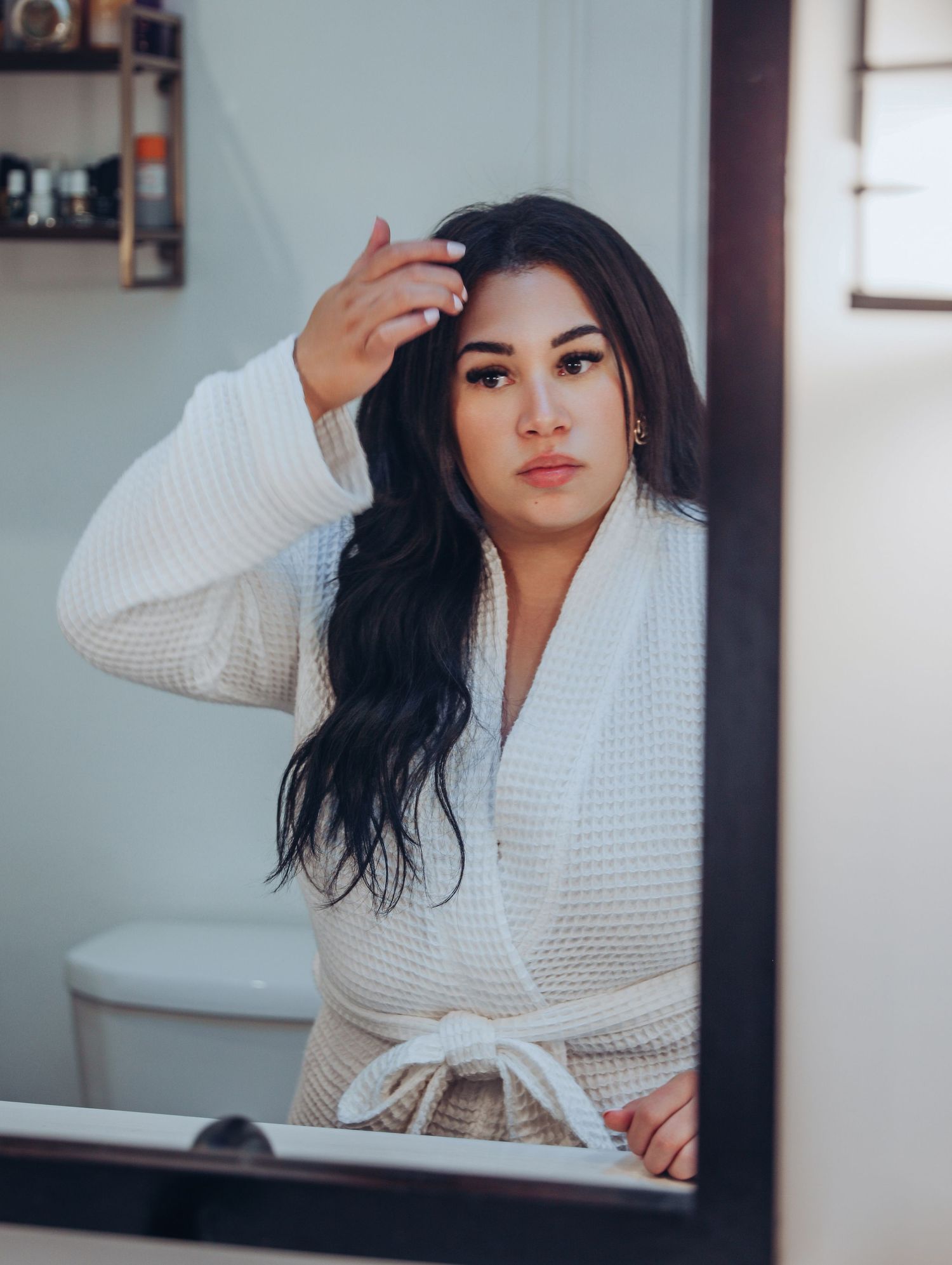 Boudoir by Bri photoshoot of small business branding and headshots for esthetician in St. Louis, in studio and wearing scrubs, skincare