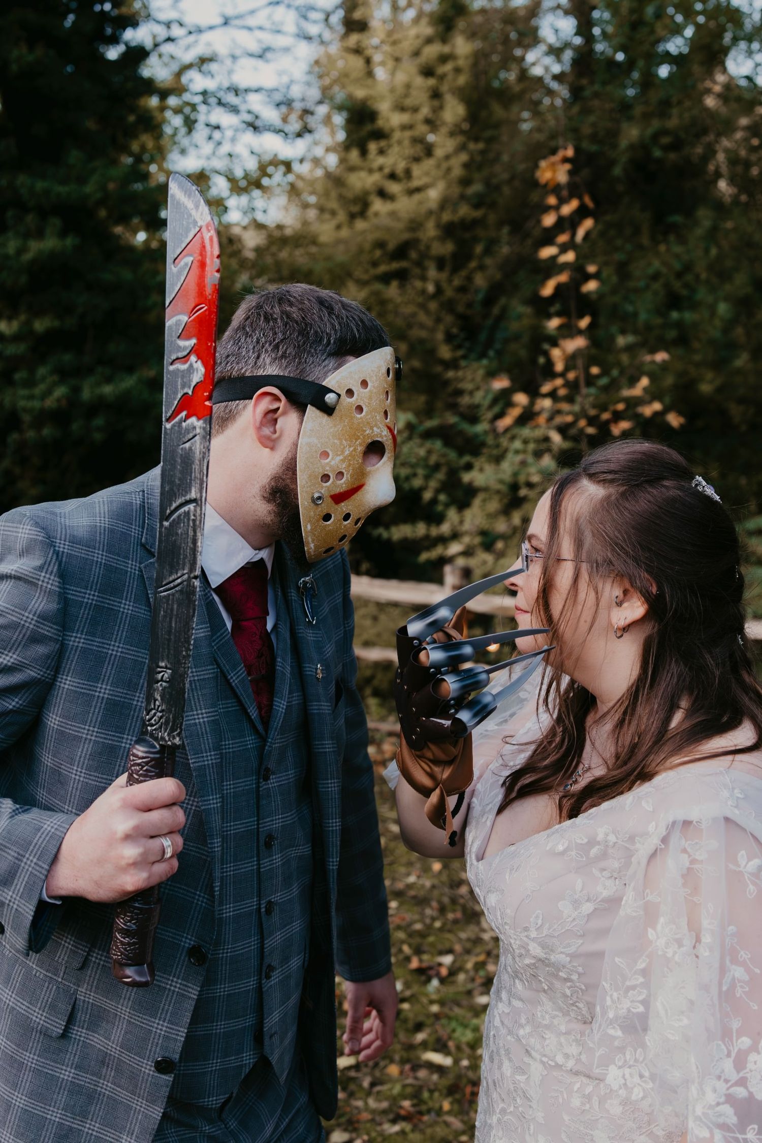 Halloween-themed wedding couple posing as Freddy Vs Jason - Halloween Wedding Photography
