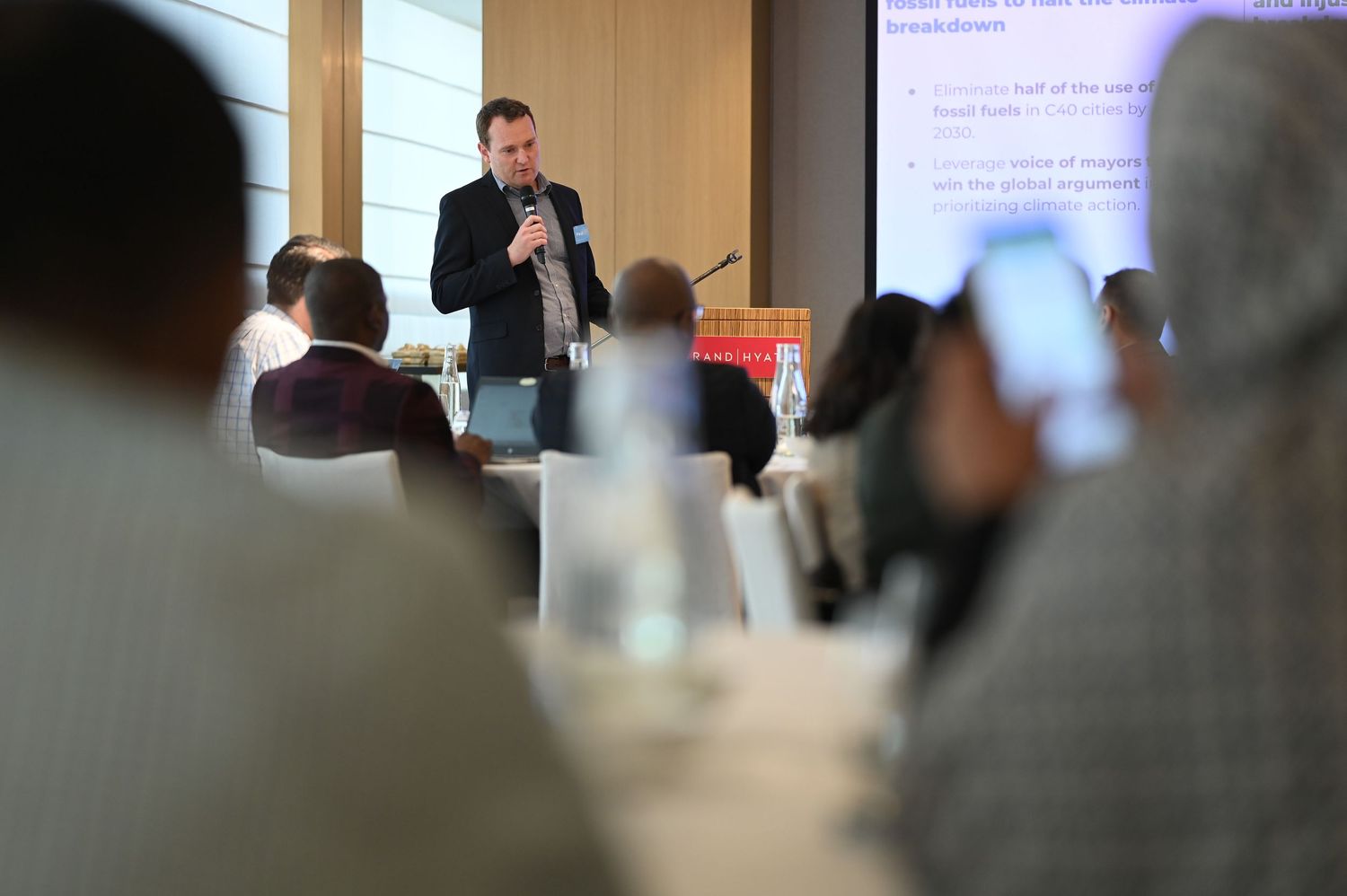 C40 cities colleague giving a speech in a talk conference