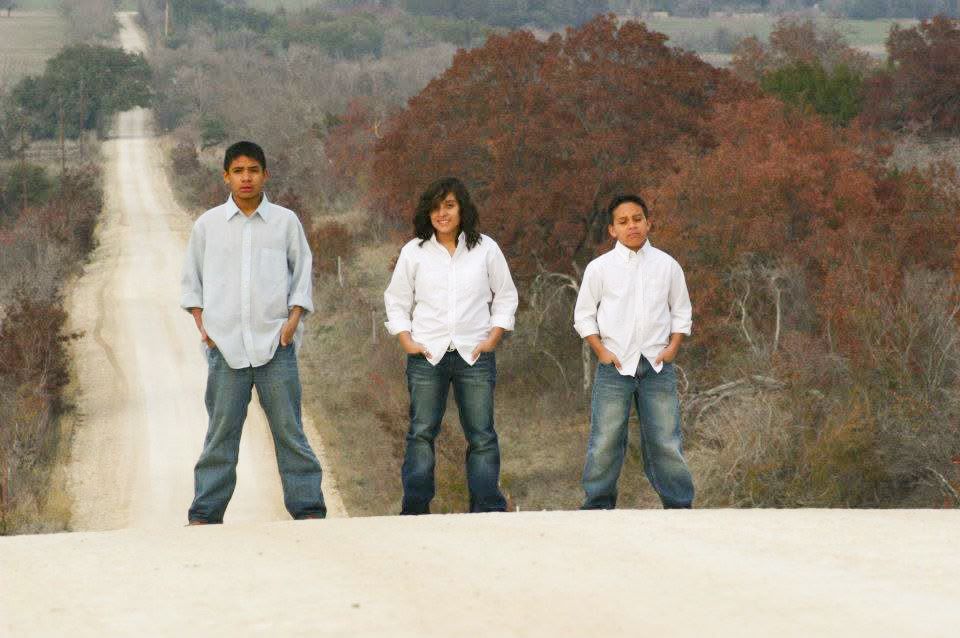 Kids atop dirt road