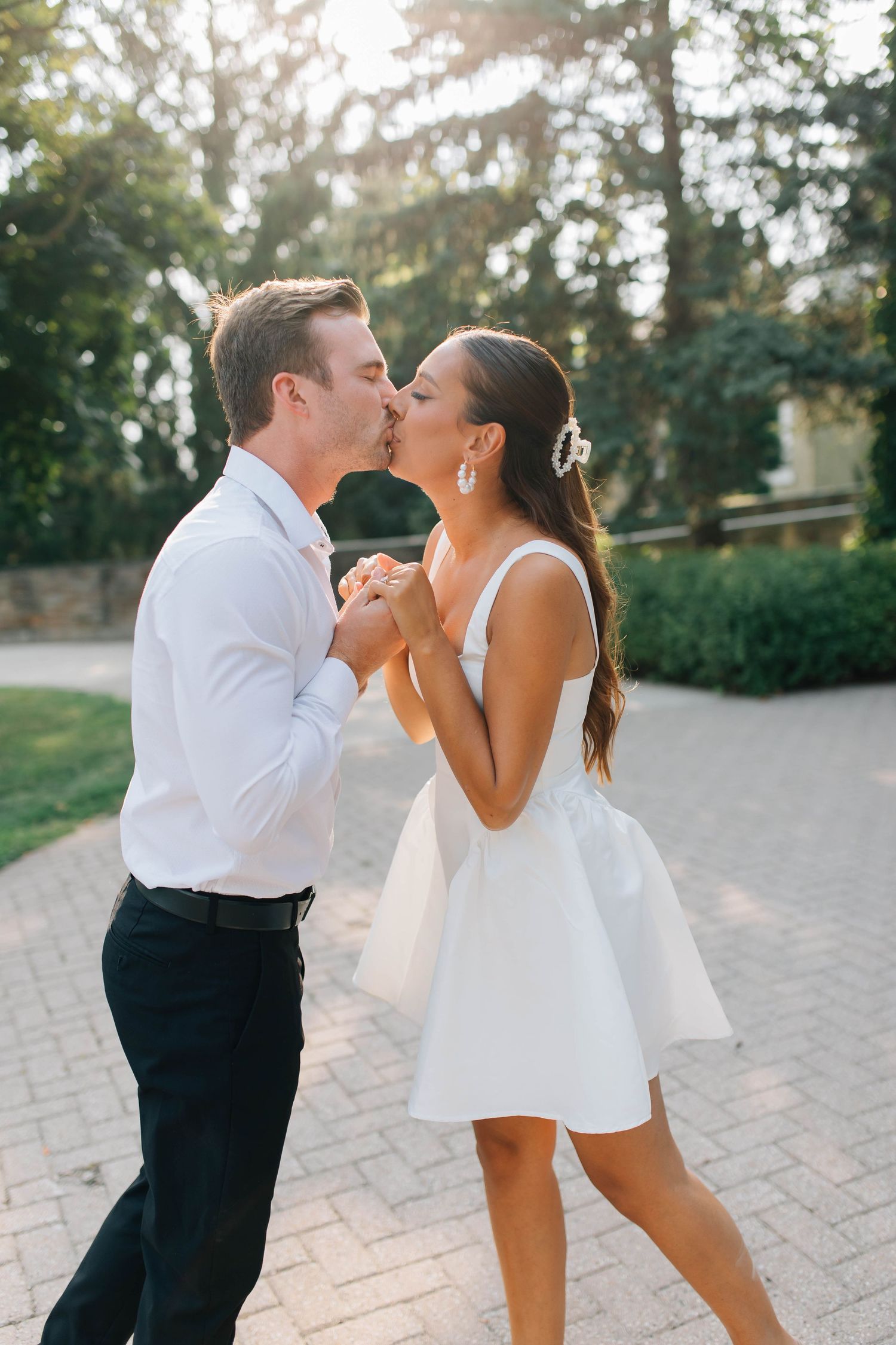 Couple kissing during engagement session in London Ontario